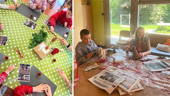 Bild 1: Die jungen Zauberer und Zauberinnen formen aus Ton Alraunen | Bild 2: Aus Zeitungen und Karton wurden sprechende Zauberhüte gebastelt. (Fotos: Laura-Marie Schlereth / BRK MB Dürerweg)